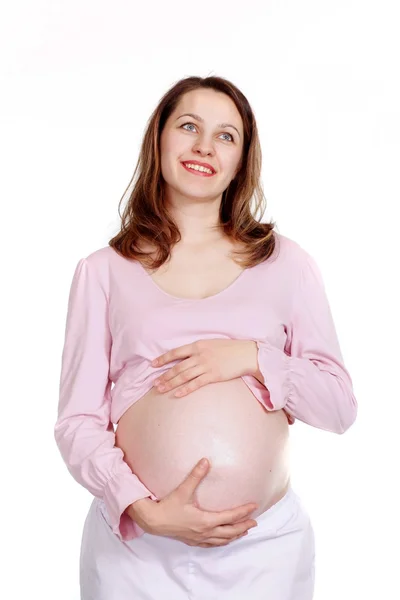 Felice donna incinta in piedi — Foto Stock