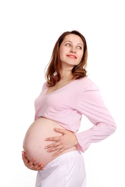 Feliz mulher grávida de pé — Fotografia de Stock
