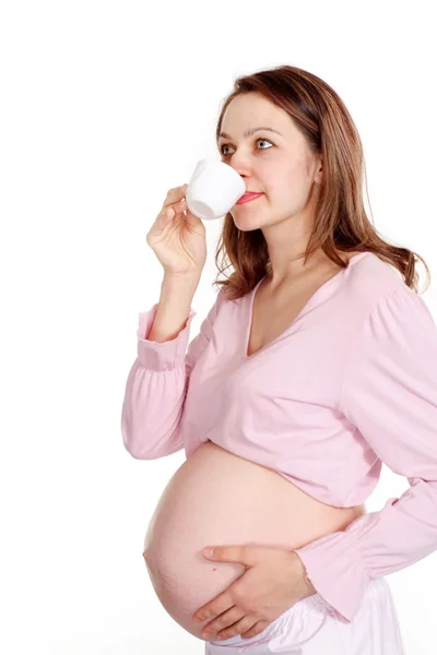 Szczęśliwy w ciąży kobiety stojącej — Zdjęcie stockowe