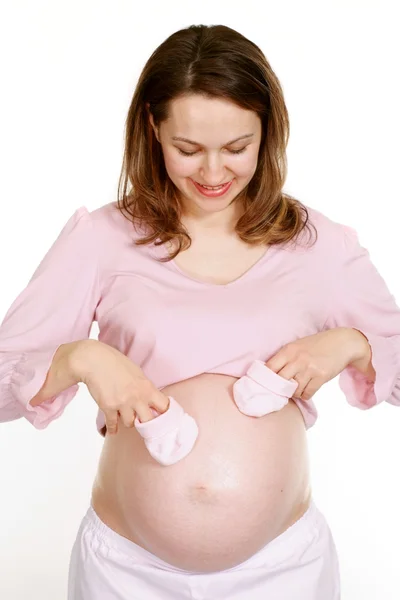 Счастливая беременная женщина стоит — стоковое фото