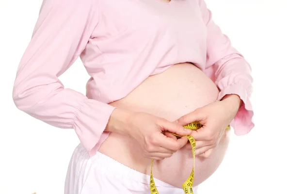 Mutlu hamile devushkas santimetre — Stok fotoğraf