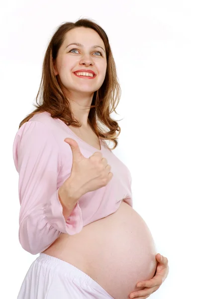 Szczęśliwy w ciąży kobiety stojącej — Zdjęcie stockowe