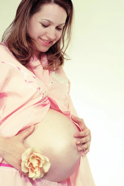 Happy pregnant woman standing — Stock Photo, Image