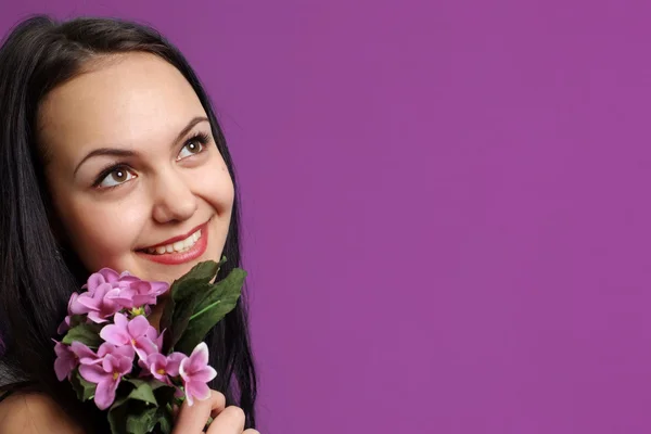 Pretty nice girl with a flower — Stock Photo, Image