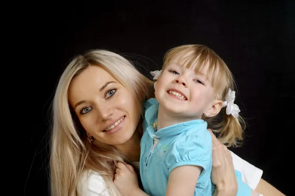 Mother and daughter sitting — Stock Photo, Image