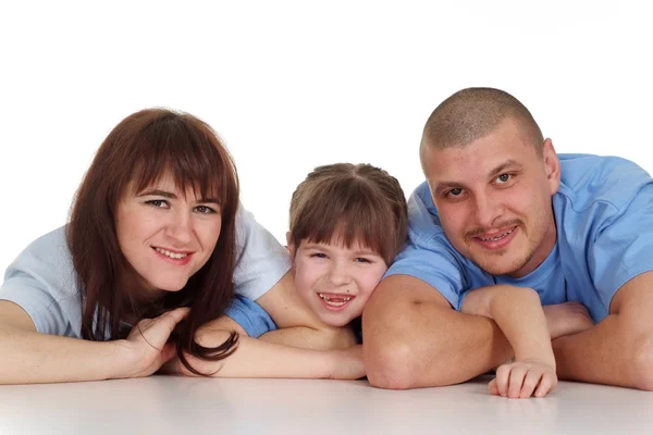 Beautiful family consisting of three fool around — Stock Photo, Image
