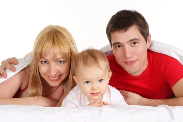 Bir çocuk ile genç bir aile — Stok fotoğraf