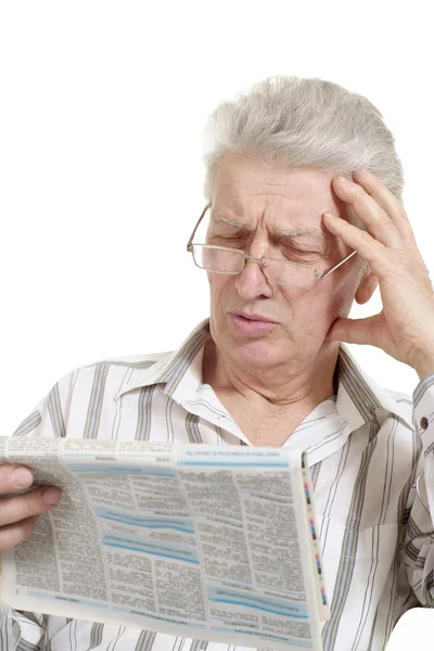 Beautiful old Caucasian man with newspaper sits — Stock Photo, Image