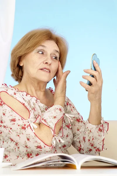 stock image Beautiful Caucasian aged lady sitting