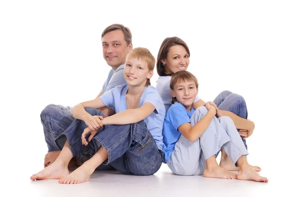 Familienporträt auf Weiß — Stockfoto