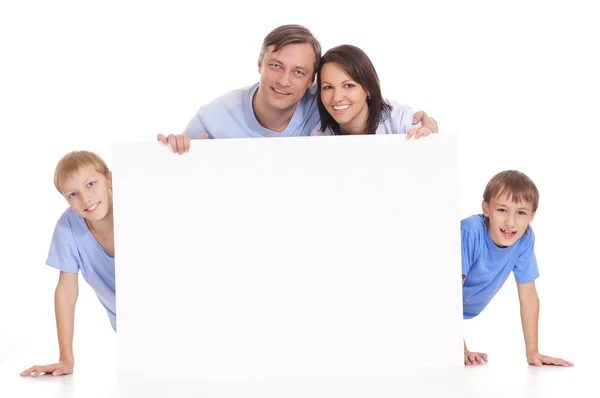 Familia con tabla —  Fotos de Stock