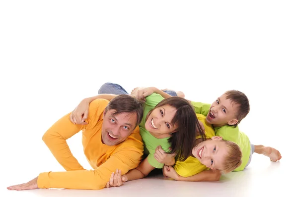 床で素敵な家族 — ストック写真