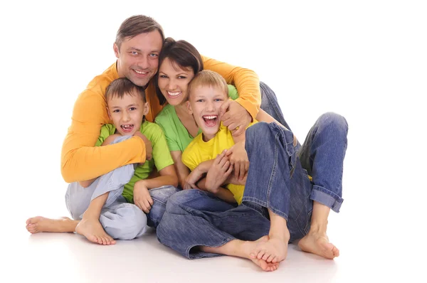 Trevlig familj på golvet — Stockfoto