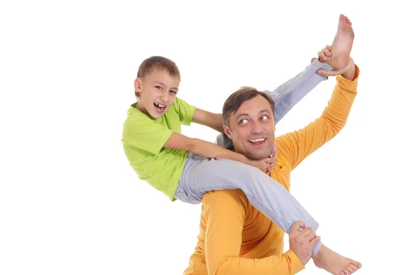 Boy on his father shoulders — Stock Photo, Image