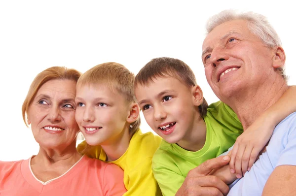 Großeltern und Enkel auf weiß — Stockfoto