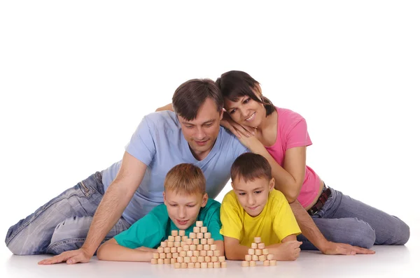 Familia jugando en el piso —  Fotos de Stock