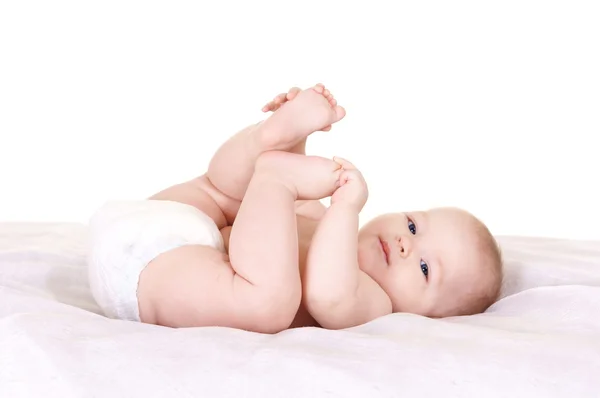 Baby at bed — Stock Photo, Image
