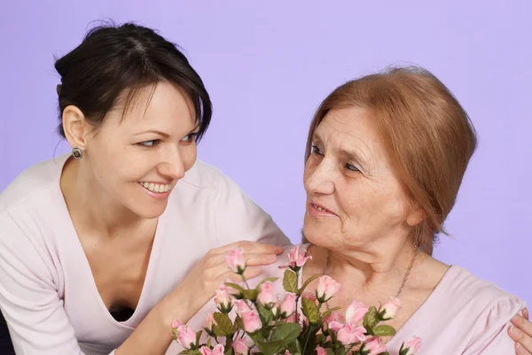 Bliss Caucasian elderly woman and her daughter — Stock Photo, Image