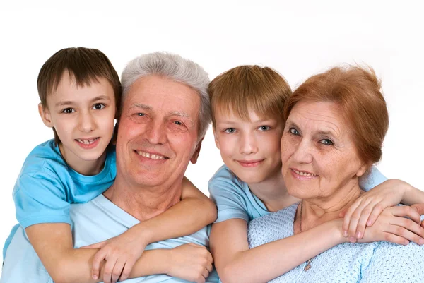 Felice nonni caucasici con bambini felici ingannati — Foto Stock