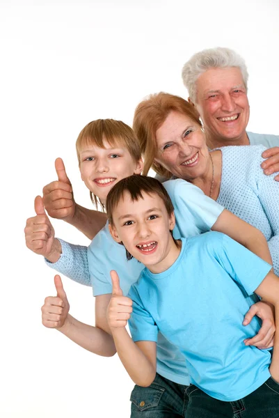 Gelukkig vreugde grootouders met kleinkinderen voor de gek houden — Stockfoto