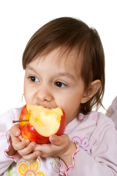 Schöne kaukasische Tochter mit einem Apfel — Stockfoto