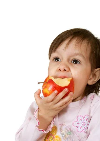 Bela filha caucasiana com uma maçã — Fotografia de Stock