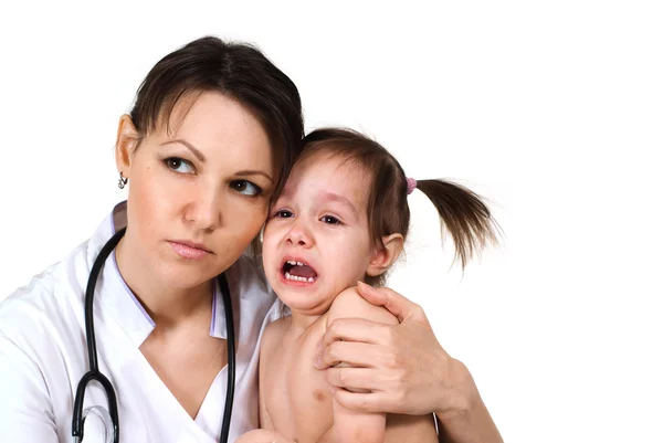 Beautiful good Caucasian nurse holding a baby girl — Stock Photo, Image