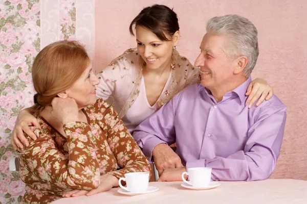 Happy Caucasian elderly parents with a daughter — Stock Photo, Image