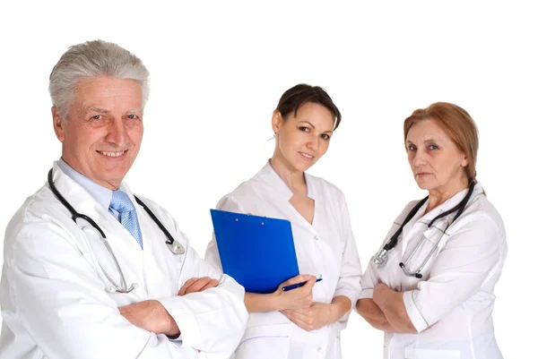 Üç güzel beyaz doktor ayakta — Stok fotoğraf