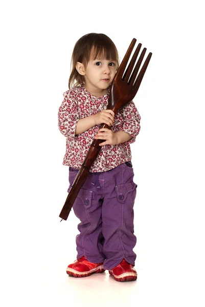 Good little Caucasian girl posing with a fork — Stock Photo, Image