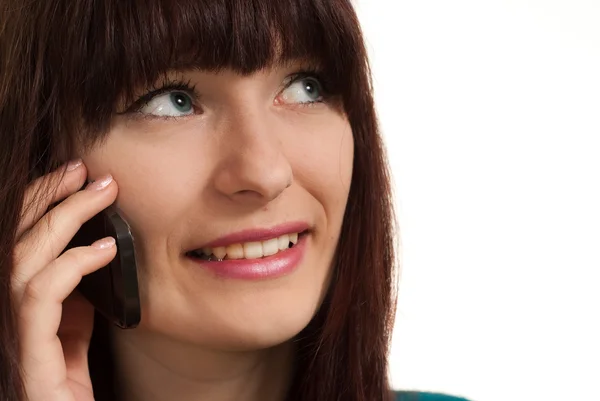 A beautiful charming girl sitting with a telephone — Stock Photo, Image
