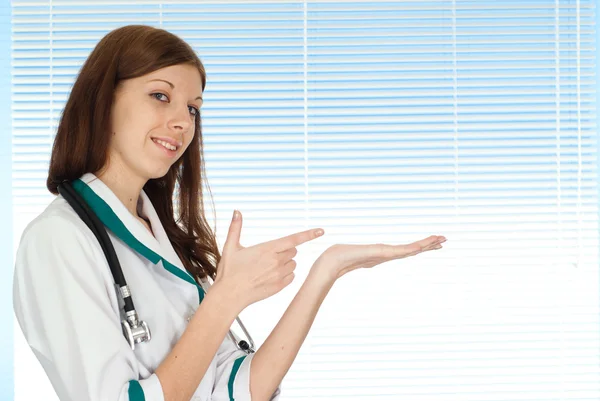 Good charming nurse stands — Stock Photo, Image