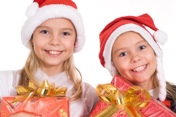 Twee meisjes met cadeau Stockfoto