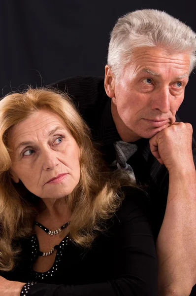 Vieux couple sur noir Images De Stock Libres De Droits