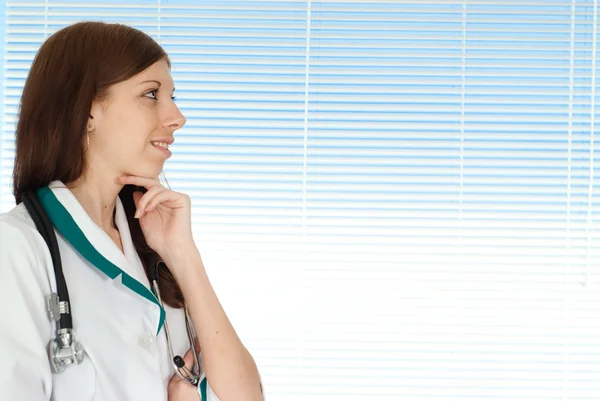 Happy charming nurse stands — Stock Photo, Image
