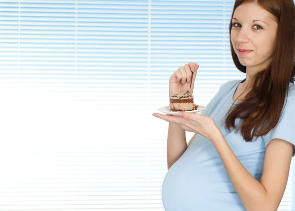 Mooi zwangere meisje permanent — Stockfoto