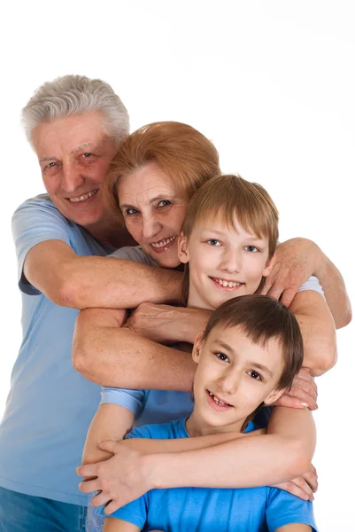 Happy good grandparents with grandchildren fooled — Stock Photo, Image