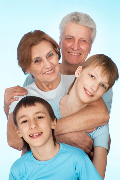 Happy nice Caucasian grandparents with grandchildren fooled — Stock Photo, Image