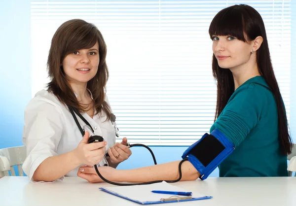 A luck Caucasian girl to the doctor Stock Photo