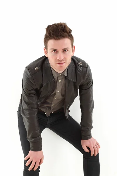 Young adult man posing with leather jacket — Stock Photo, Image