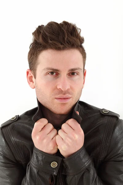 Young adult man posing with leather jacket — Stock Photo, Image
