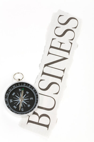 Headline business and Compass, concept of decision