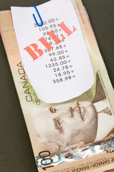 Bills and canadian dollars Stockafbeelding
