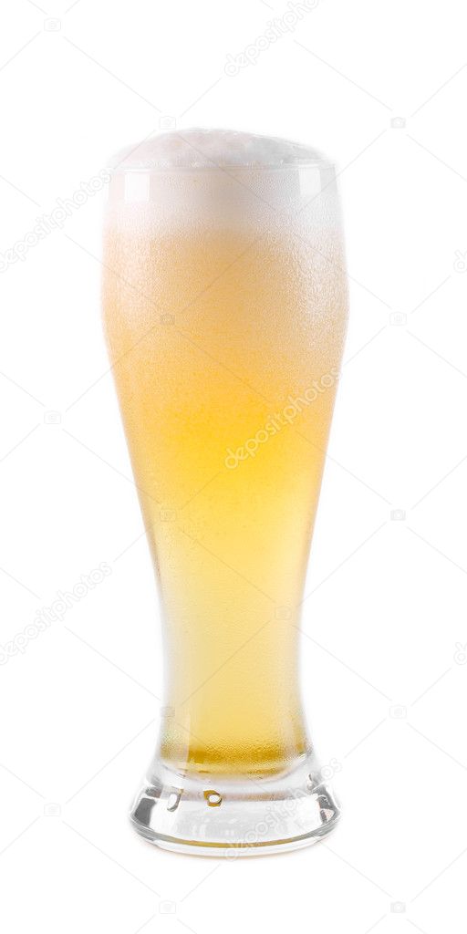 Beer into glass isolated