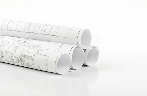 Rolled construction plans isolated — Stock Photo, Image