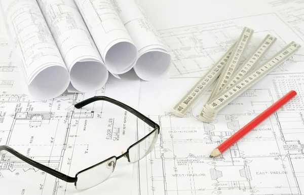 Construction plans and glasses — Stock Photo, Image