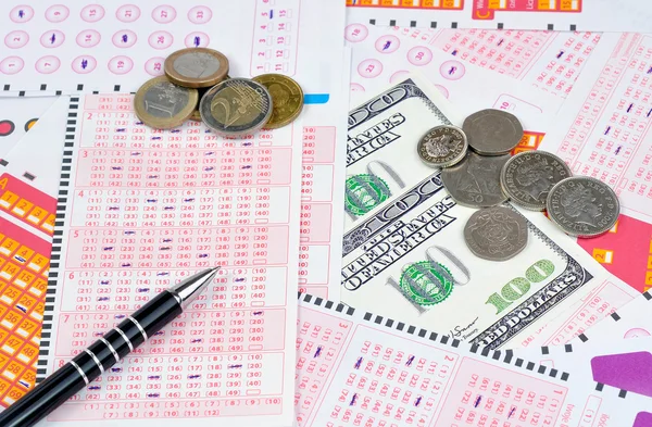 Lottery tickets and money — Stock Photo, Image