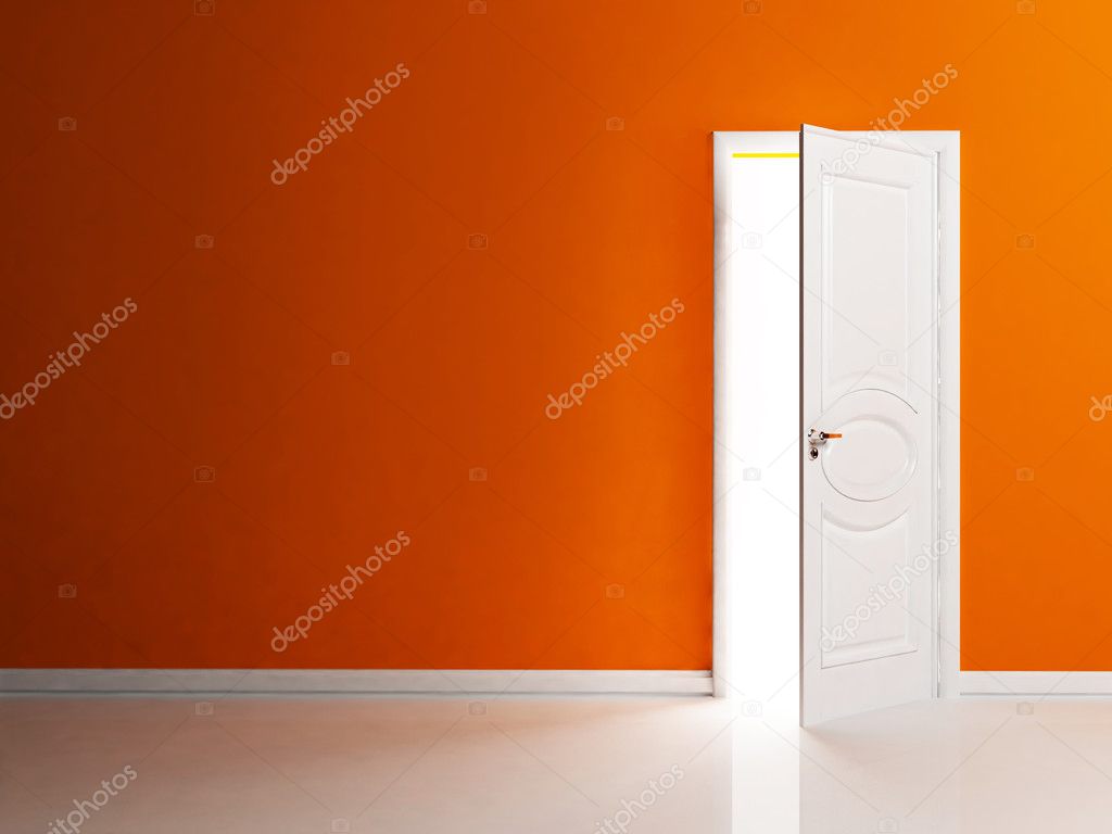 White opened door in the empty room