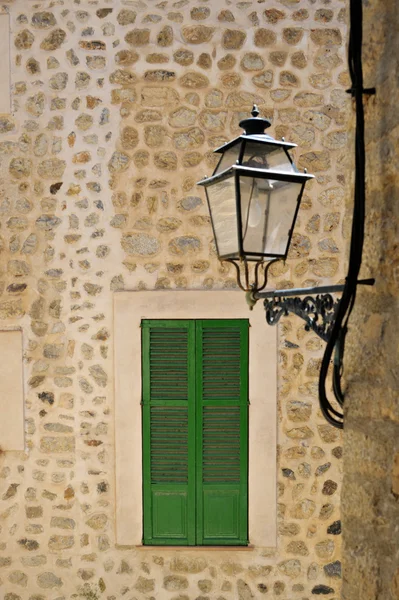 Typical mediterranean window and stret lamp — Stock Photo, Image