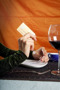 Paying with credit card at restaurant clipart